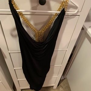 Form fitted black backless cocktail dress